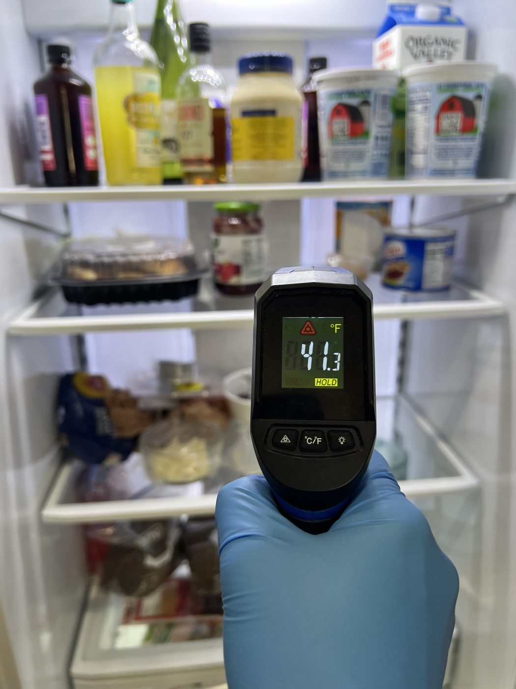 Infrared thermometer diagnosing refrigerator cooling